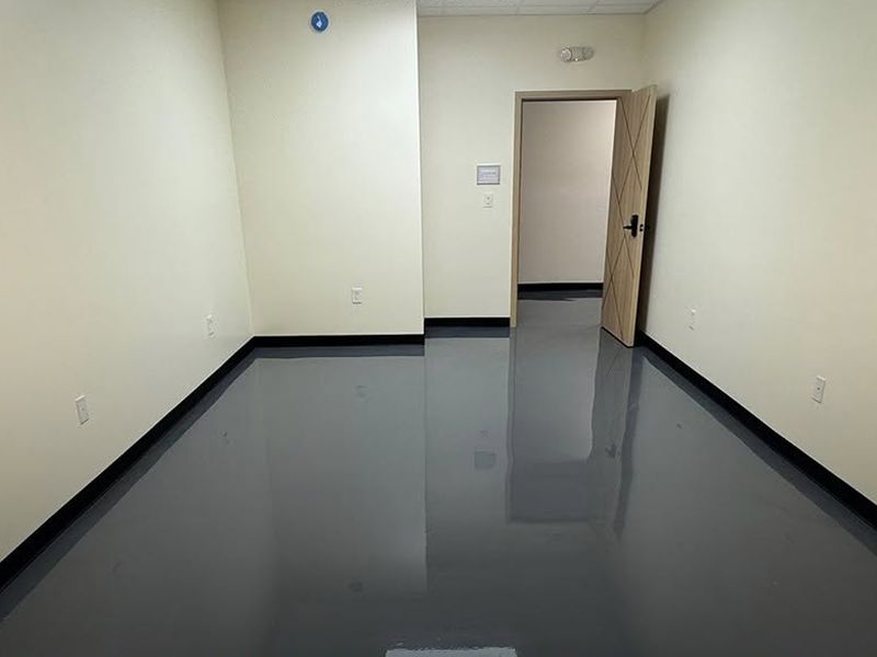Open door into a finished private suite